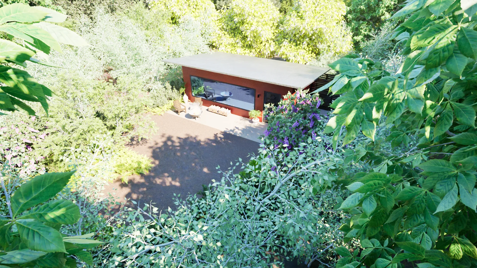Aerial view of a cabin nestled in trees