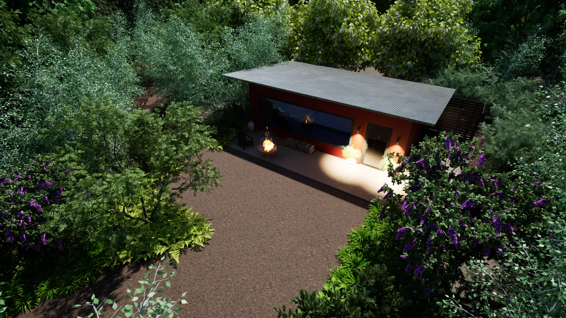 Aerial twilight view of a cabin with fire pit lit