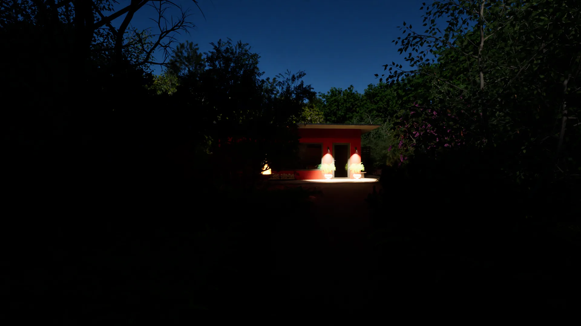 The cabin at dusk, light spilling from the windows