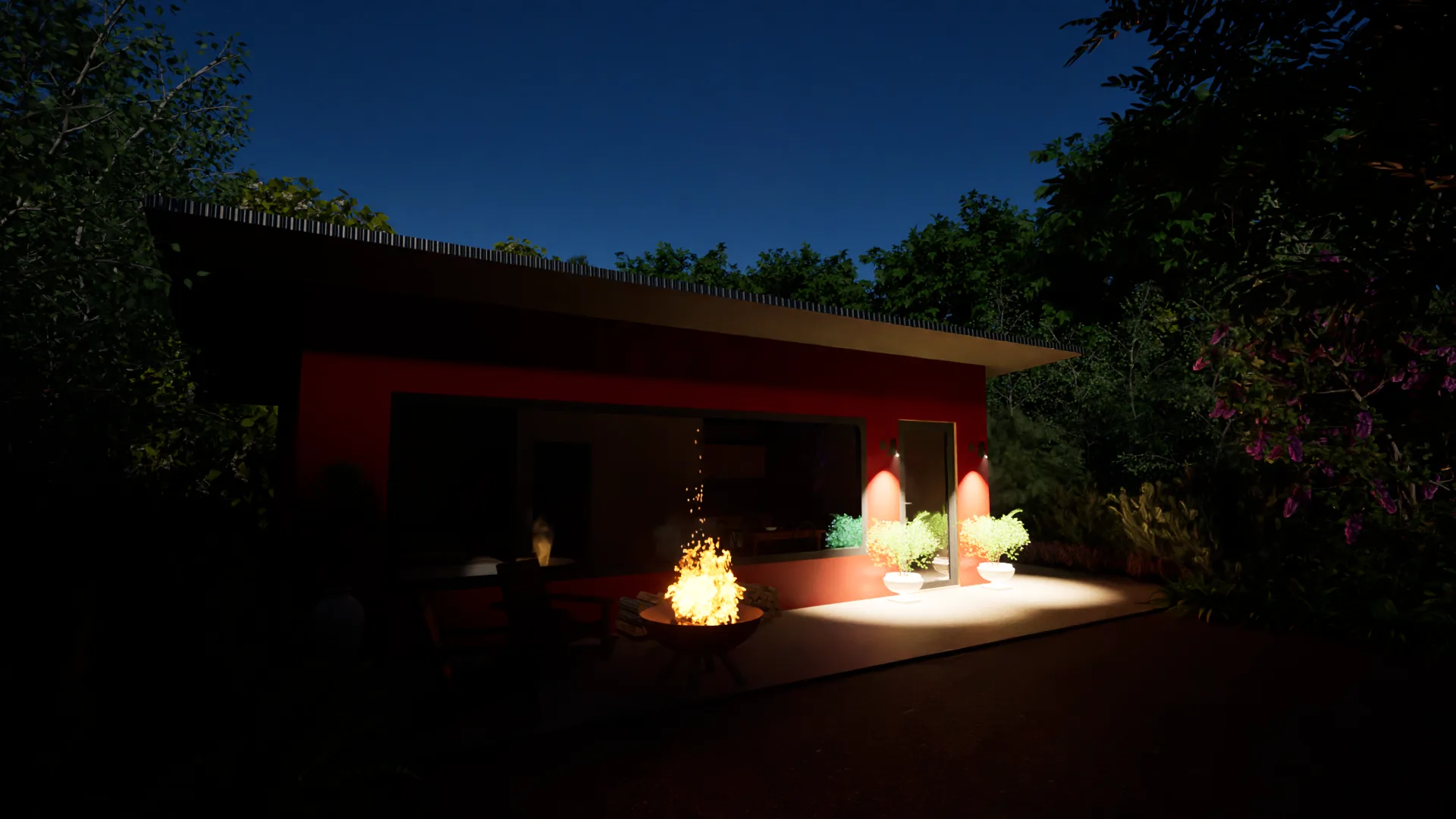 The pavilion at night, fire pit lit